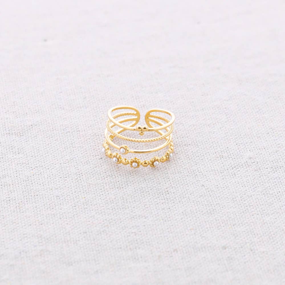 Anillo Acero cuatro Tiras Cuentas