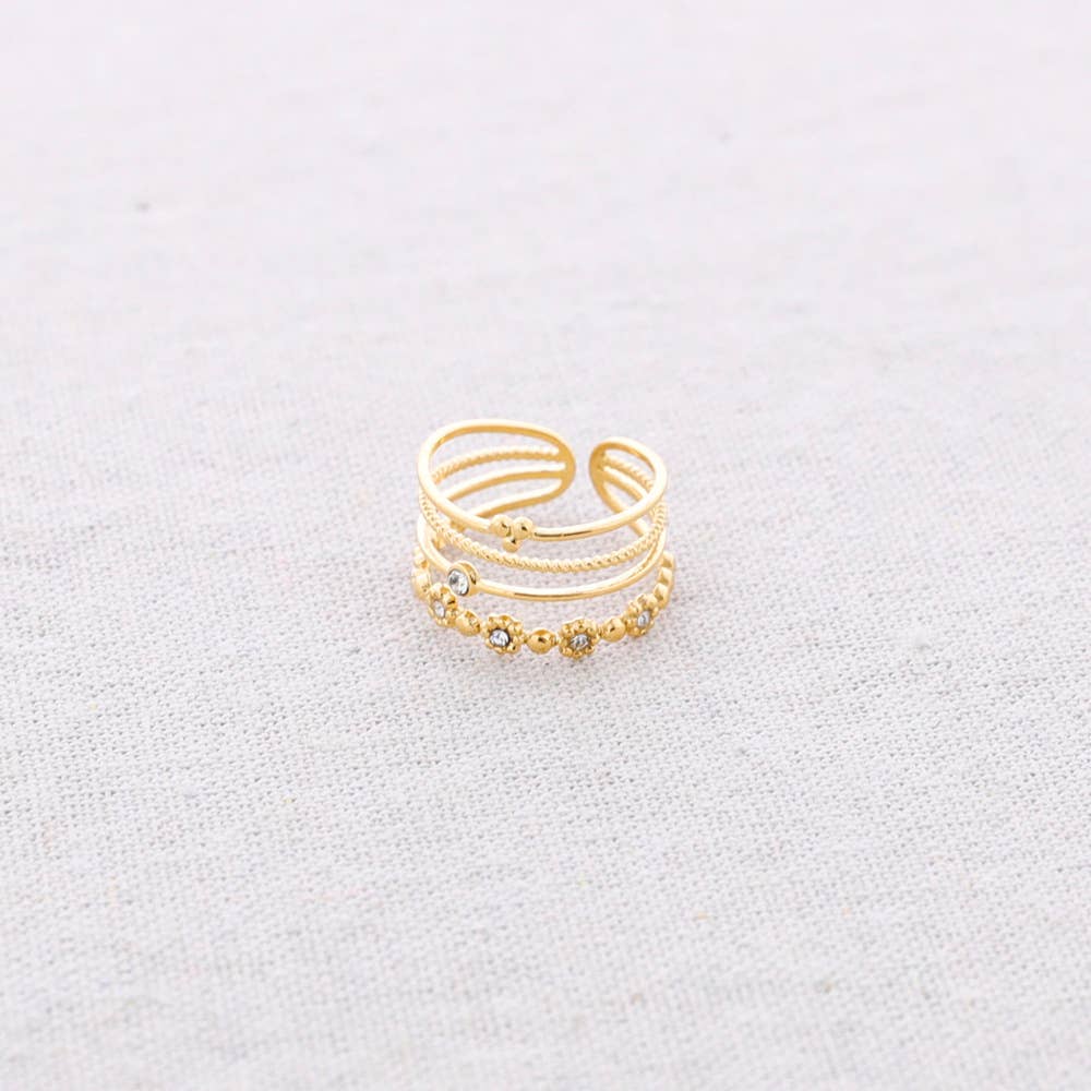 Anillo Acero cuatro Tiras Cuentas